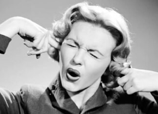 Mom Plugging Ears from Noise