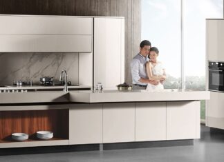 The Latest in Kitchen Design: Staying Abreast of the Trend couple-enjoys-their-Euro-style-cabinets