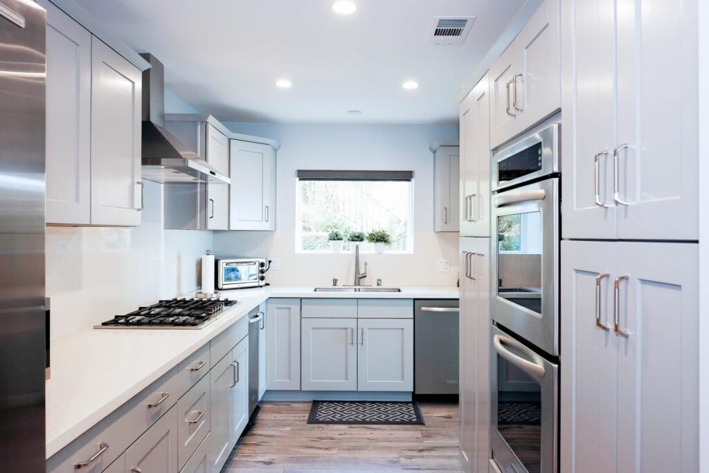 Warmth & Neutrality Combined: Gray Kitchen Cabinets