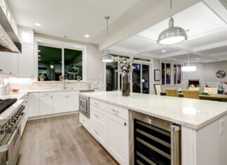white shaker kitchen with large island