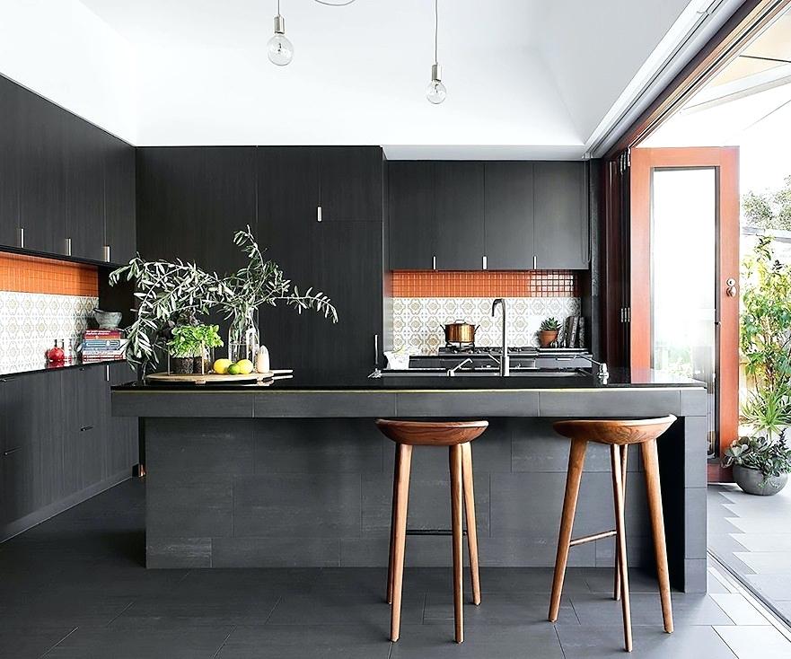 black kitchen cabinets with red bar stools