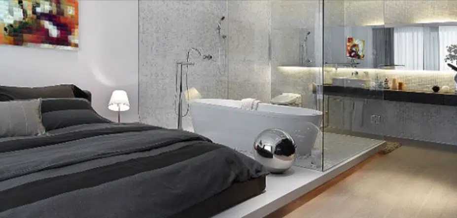 open bedroom and bathroom layout with glass partition and exposed toilet