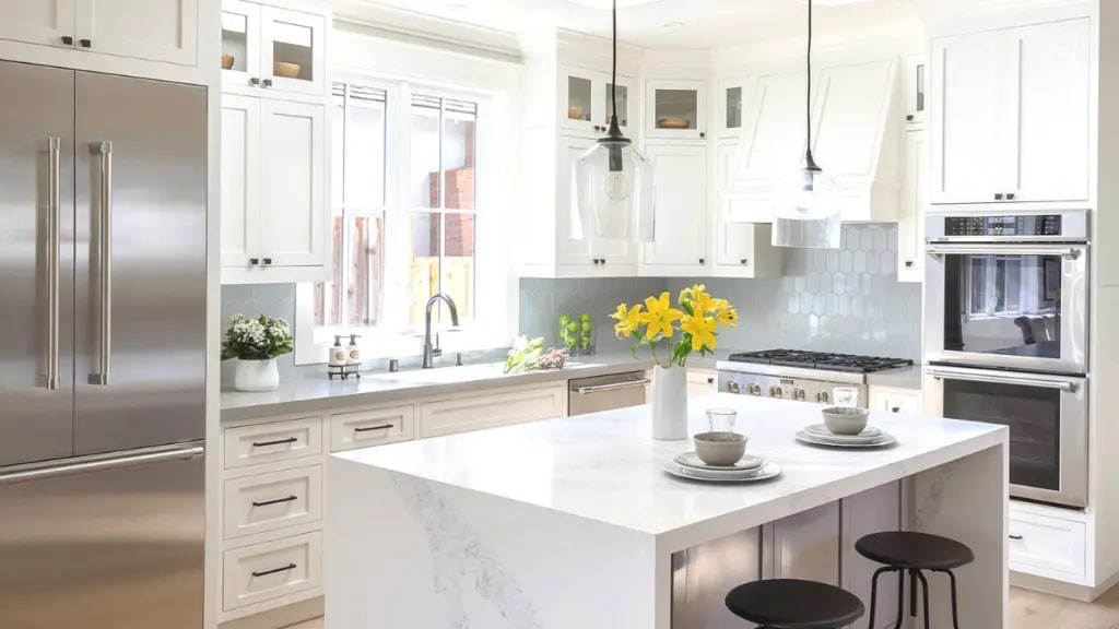 quartz countertop for a modern look with white shaker cabinets