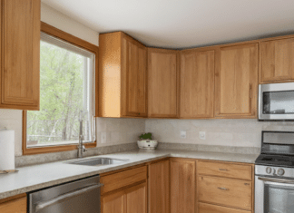 The Ultimate Guide To Wood Cabinets In The Kitchen kitchen with warm oak wood cabinets for a timeless look