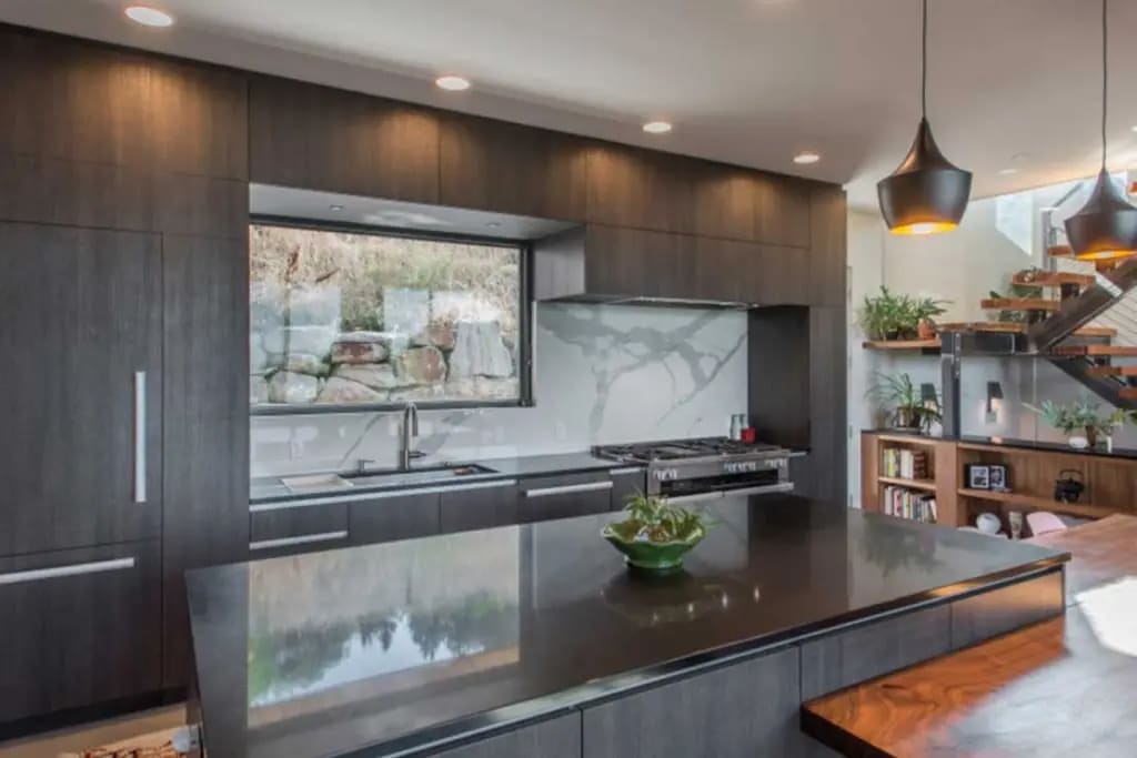 Contemporary Kitchen with wood grain flat panels