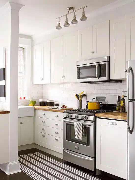 snug and bright all white kitchen