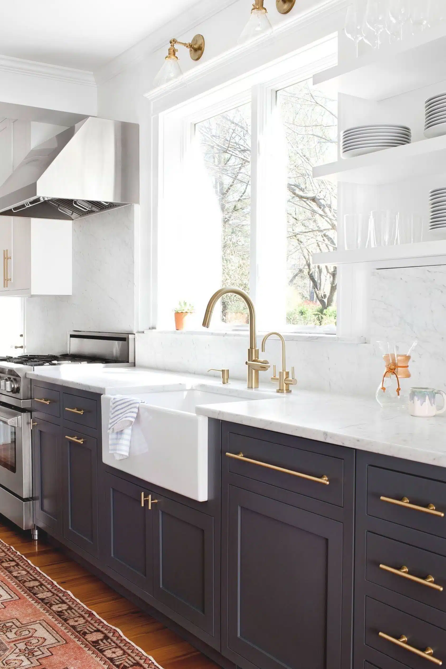 kitchen design featuring brass and gold cabinet pulls