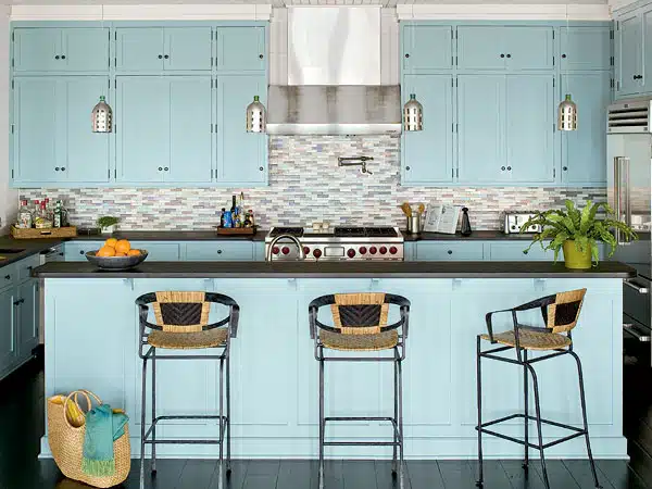 coastal kitchen design idea featuring shaker cabinets in soft blue teal color