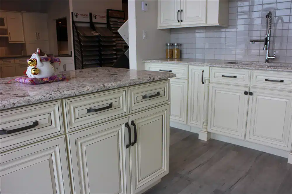 kitchen cabinet design featuring white raised panel doors