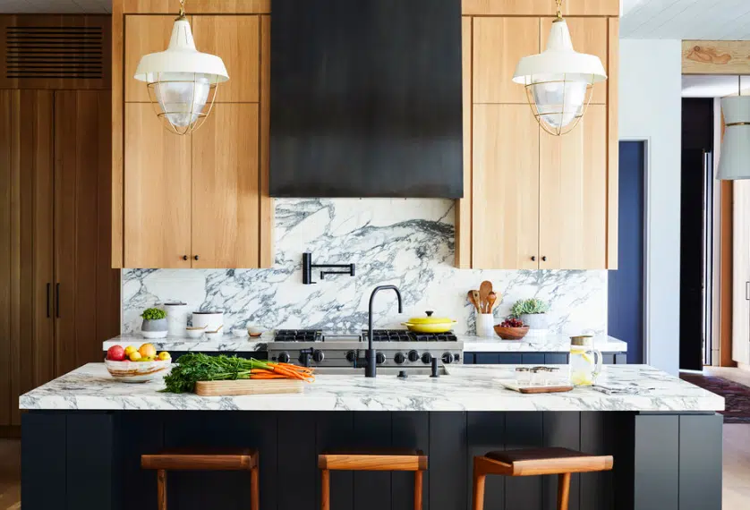 kitchen design with marble backsplash and countertop