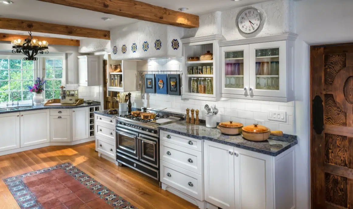 mediterranean kitchen design with wood beams and display cabinets