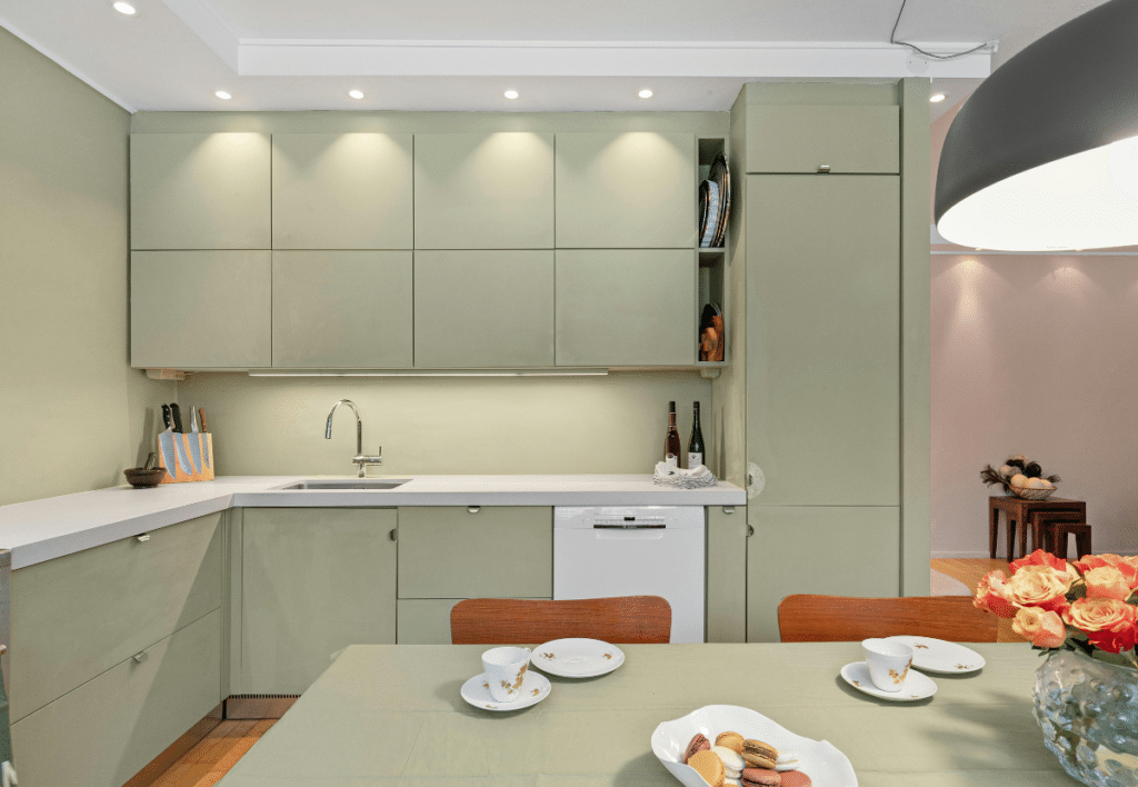pastel green kitchen design with european style cabinets